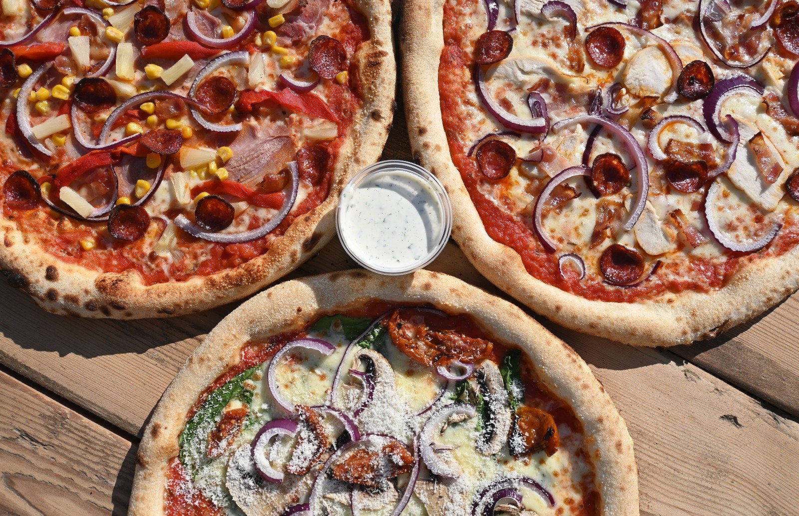 Wood Fired Pizzas with Many different variations including create your own at Copthorne, East Grinstead and Horley